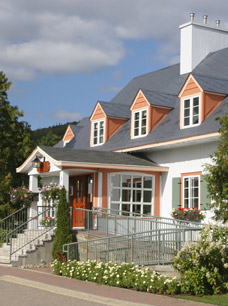 Estate Taxation - Image of white and peach coloured house